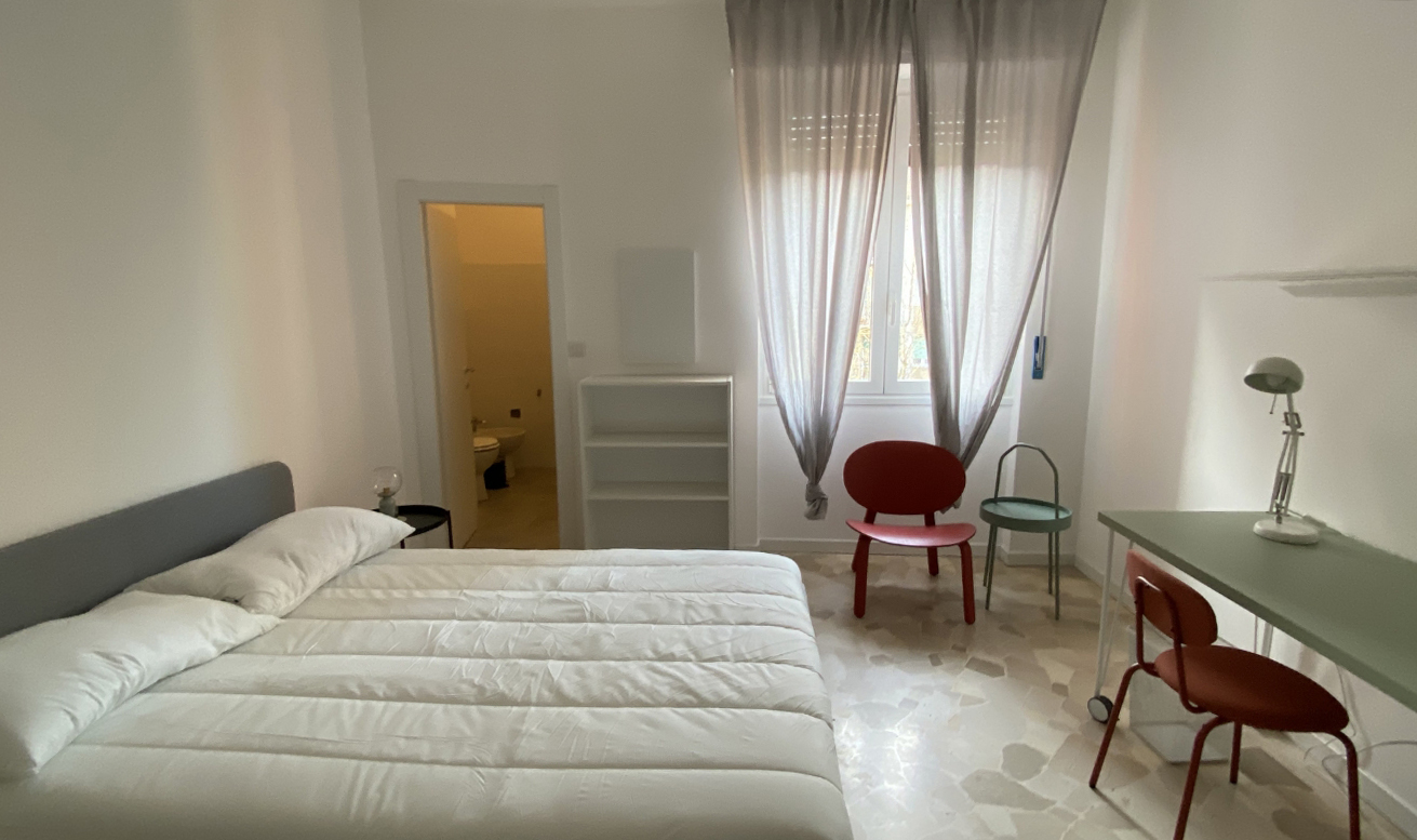 Schlafzimmer einer Wohngemeinschaft in Florenz